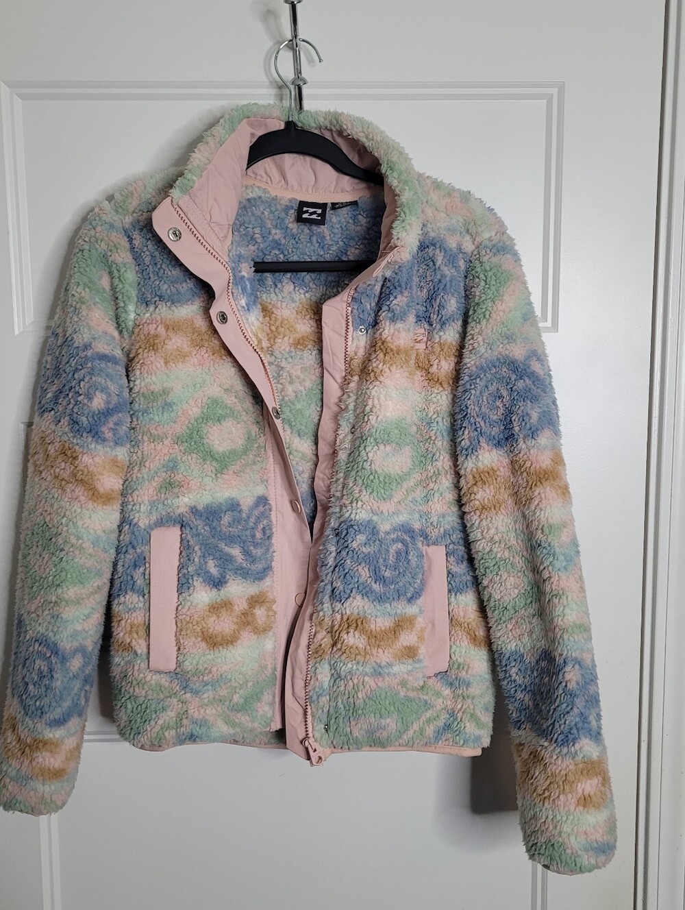 Billabong women's fleece or sherpa jacket label in a size medium